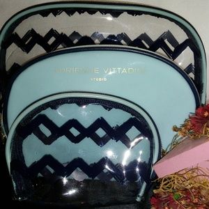 ADRIENNE VATENNI MAKE AND TRAVEL BAGS